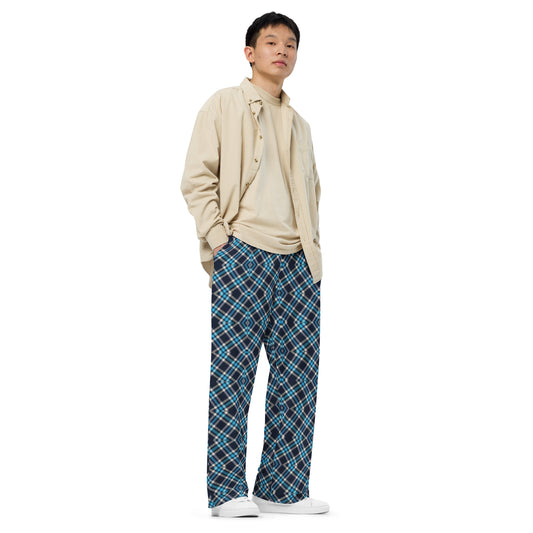 Beige button-up shirt over t-shirt with all-over print wide-leg plaid pants