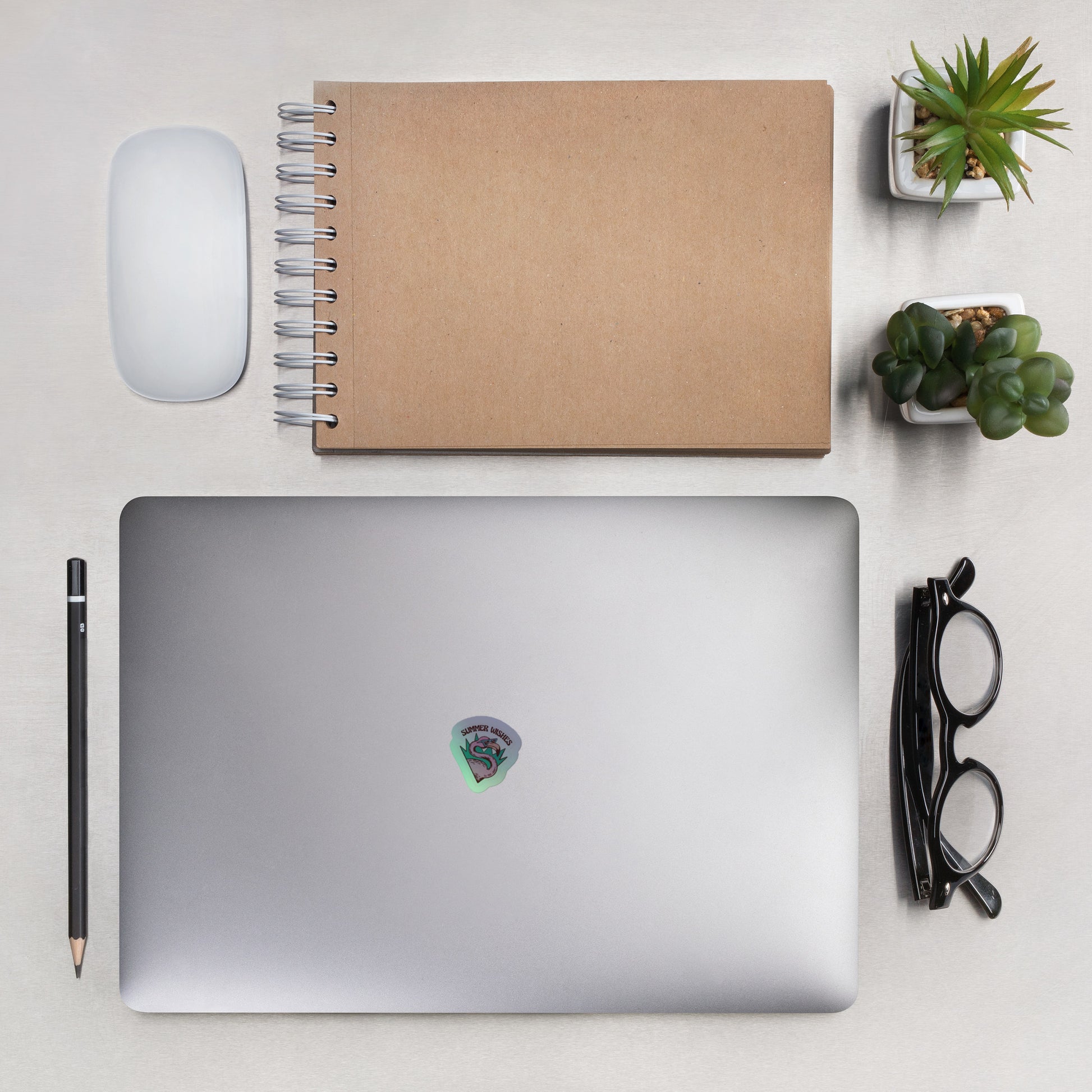 Silver laptop with small Holographic stickers V2 sticker on lid