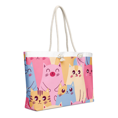 Oversized weekender bag with colorful cartoon cats in pastel hues